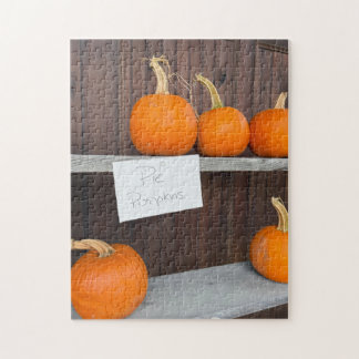 Pompoenen voor taarten op houten plank legpuzzel