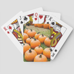 Pompoenen voor verkoop op de markt van een boer pokerkaarten