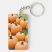 Pompoenen voor verkoop op de markt van een boer sleutelhanger (achterkant)