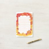 Pompoengloed en vallende bladeren post-it® notes (Op bureau)