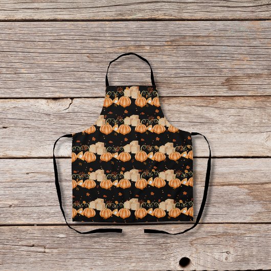 Pompoentaarten en bruine suikerklontjes zwart schort