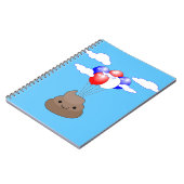 Poo emoji vliegt met ballonnen in blauwe lucht notitieboek (Linkerzijde)