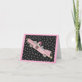 Poodle met Kerstmis in een roze cabriolet