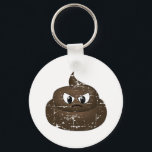 Poopgordel voor hoekvervorming Cartoon Sleutelhanger<br><div class="desc">Een tekening van een boze poep. Cartoon karakter met een verstoord effect.</div>