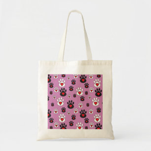 Pootafdrukken met rode harten op roze tote bag