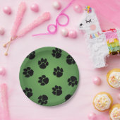 Pootafdrukken op groen papieren bordje (Feest)