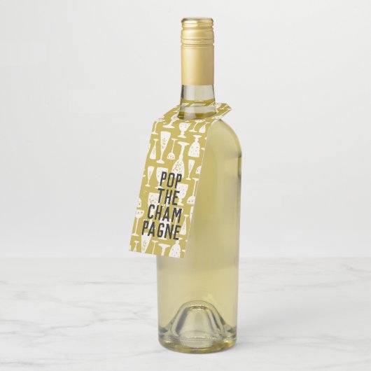 POP DE CHAMPAGNE Wit op Gouden Wijnbril Flessenhanger (Schuin)