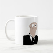 Pop kijkend naar jou koffiemok (Links)
