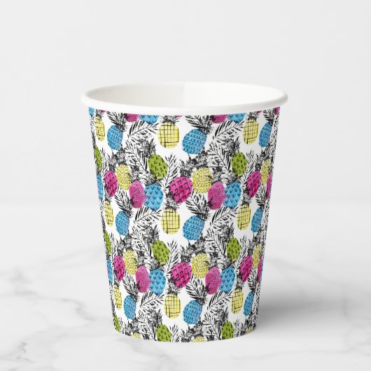 Pop kunstananassen en palmbladeren papieren bekers (Links)