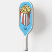 Popcorn cartoon illustratie pickleball paddle (Links)