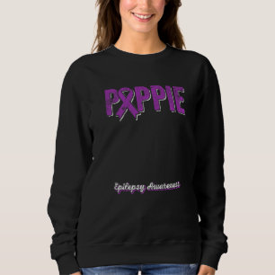Poppie van een Warrior Epilepsy Poppie Paarse Lint Trui