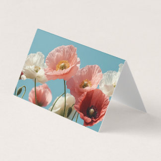 Poppies veld tegen een blauwe zachte hemel kaart