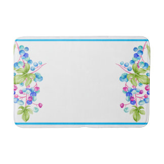 Porseleinen bessen op een badmat