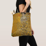 Portret van Adele Bloch-Bauer I van Gustav Klimt Tote Bag<br><div class="desc">Het portret van Adele Bloch-Bauer I (1903-1907) van Gustav Klimt is een schilderij van het Victoriaans Era Symbolisme met een mooi kunstportret. Portret van Adele Bloch-Bauer I staat ook bekend als The Lady in Gold of the Woman in Gold. Het portret shows Adele Bloch-Bauer op een gouden stoel voor een...</div>