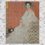 Portret van Fritza Riedler door Gustav Klimt Legpuzzel<br><div class="desc">Het portret van Fritza Riedler (1906) van Gustav Klimt is een Victoriaans tijdperk van symboliek. Fritza Riedler zit in een fauteuil versierd met gouden en zilveren oogvormige motieven. De gouden en zilveren vierkanten worden herhaald over de achtergrondmuur. Gustav Klimt (Wenen, 1862 - aldaar, 1918) was een Oostenrijks symbolistisch kunstschilder en...</div>