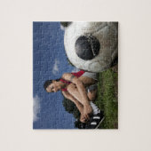 portret van vrouw football player die haar bindt legpuzzel (Verticaal)