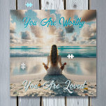 positieve bevestiging | Ik ben liefde waardig Legpuzzel<br><div class="desc">Puzzel met een positieve affirmaties citaat. Je bent waardevol,  je bent geliefd. Ai art illustratie van een vrouw die mediteert door de helderblauwe oceaangolven,  omringd door zee,  op een zandstrand,  met prachtige wolken die in de lucht zweven.</div>