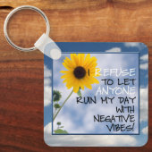 Positieve tekst met een zonnebloem in de lucht sleutelhanger (Voorkant)