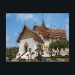 Postcard of a scenic temple in Thailand Briefkaart<br><div class="desc">Photo of a dazzling white temple under a blue sky. The temple,  in the heart of Thailand,  has gold trimmings and traditional Thai architecture  It is surrounded by trees. Stairs lead to one of the entrances. The roof is red and Thai art adorns the outside of the temple.</div>