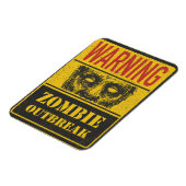 Poster Zombie Outbreak. Raad voor gebaren met Zomb Magneet (Linkerzijde)