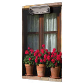 Poten voor bloemen in het dorp klembord (Links)