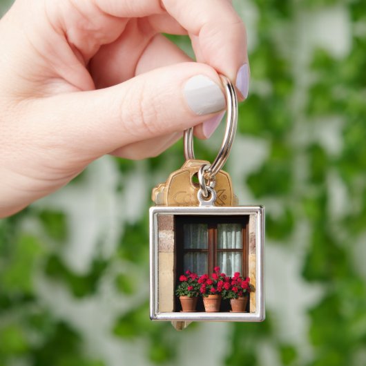 Poten voor bloemen in het dorp sleutelhanger (Hand)
