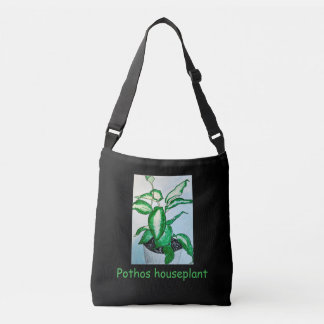 Pothos kamerplant op zwart crossbody tas