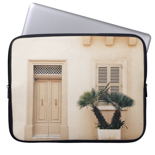 Potter plant nabij betonhuis laptop sleeve (Voorkant)