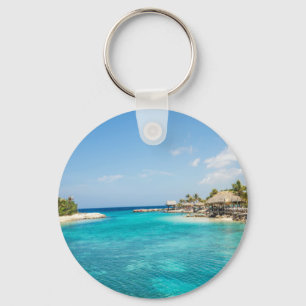 Prachtige Blauwe Tropische Beach met Thatched Huts Sleutelhanger
