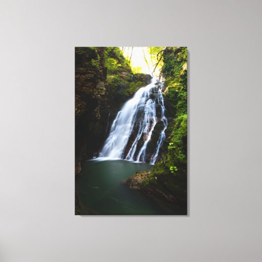 Prachtige waterval met zonlicht gloed canvas afdruk (Voorkant)