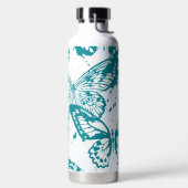 Prachtige weergave van blauw omlijnde vlinders waterfles (Links)