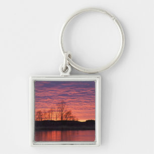 Prachtige zonsondergang weerspiegelt zich in de Ca Sleutelhanger