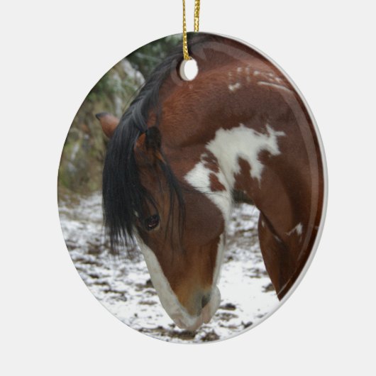 Pranching in de sneeuw keramisch ornament (Links)