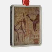 Prehistorische rotsschilderijen met kamelen en metalen ornament (Rechts)
