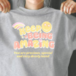 Preppy blijven geweldige slogan smilie gezicht t-shirt<br><div class="desc">Preppy stijl kind vertrouwen booster T-shirt. Lees Blijf geweldig met een lachend gezicht met sterrenogen en regenboogstrepen in pastelgeel,  koraal,  roze ontwerp. Personaliseer met uw eigen extra keuze van de formulering,  momenteel leest,  je bent kostbaar,  speciaal en zeer geliefd. Originele grafische kunst en design door www.mylittleeden.com op Zazzle.</div>