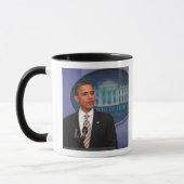 President Barack Obama doet een aankondiging Mok (Links)