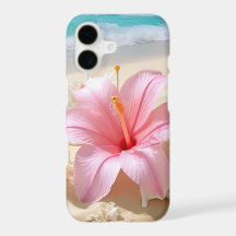PRETTE ROZE HIBISCUSBLOEM OP ZANDSTRAND