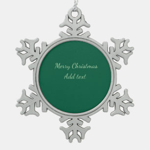 Prettig kerstfeest groene effen solo achtergrond h tin sneeuwvlok ornament