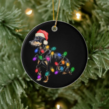 Prettig kerstfeest hond in lichtjes verstrikt