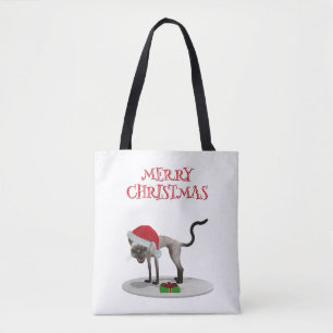 Prettig kerstfeest. Kat met kerstmuts Tote Bag