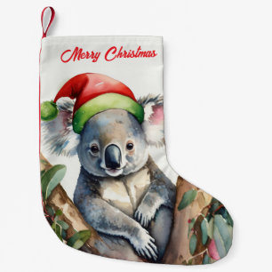 Prettig kerstfeest koala zittend in eucalyptusboom kleine kerstsok