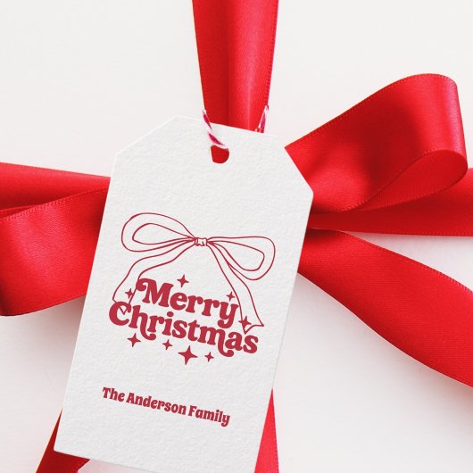 Prettig kerstfeest rode handgetekende strik retro cadeaulabel