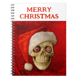 Prettig kerstfeest. Schedel met kerstmuts Notitieboek
