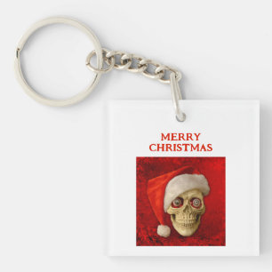 Prettig kerstfeest. Schedel met kerstmuts Sleutelhanger