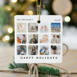 Prettige feestdagen Aangepaste 12 fotocollage Keramisch Ornament<br><div class="desc">Creëer uw eigen kerstversiering met deze moderne fotoroostercollage en -tekst. Ontwerp beschikt over 12 (twaalf) afbeeldingen naar keuze, de tekst 'HAPPY HOLIDAYS', familienaam en jaar. Dit is een geweldig cadeau voor vrienden, familie of jezelf deze kerst. FOTO TIP: Snijd en centreer je afbeeldingen voordat je ze uploadt voor de beste...</div>