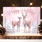 Prettige feestdagen Herten in het roze winterbos