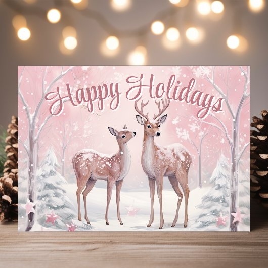 Prettige feestdagen Herten in het roze winterbos