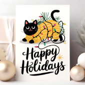 Prettige feestdagen Kat gewikkeld in kerstverlicht