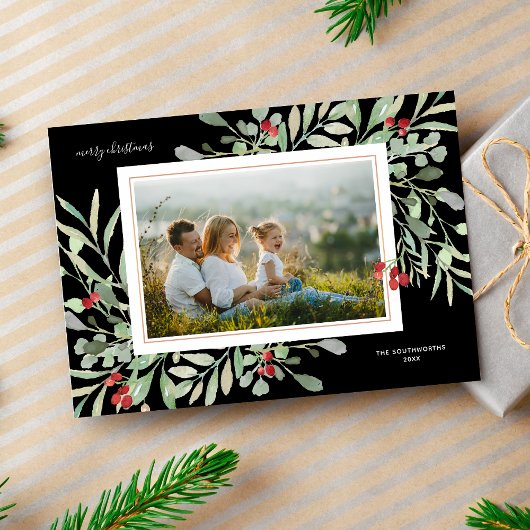 Prettige kerstfoto Winterloof rode bessen Feestdagenkaart