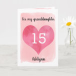 Pretty Pink Heart 15th Birthday Granddaughter Kaart<br><div class="desc">A pink 15th birthday granddaughter card, which features a watercolor heart against pink watercolor. You can personalize the heart with the age you need and add her name underneath the heart. The inside message can be easily edited if wanted. The back of the card has a smaller version of the...</div>